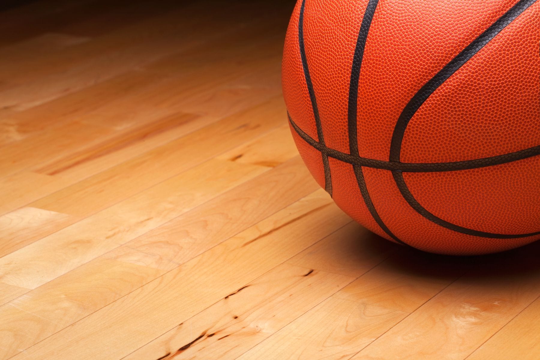 basketball-on-a-maple-hardwood-court-floor-PZQAJHC